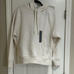 Zip Front Pocket Cream Pullover Hoodie with Long Sleeves and Relaxed Fit